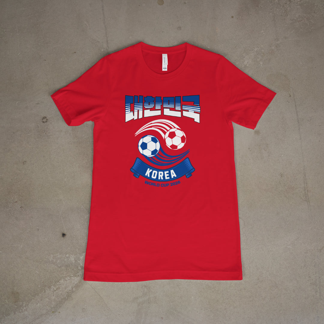 Red t-shirt with soccer ball design and 대한민국  text on flat lay