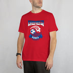 Red t-shirt with soccer design and Republic of Korea text by a person on a plain background