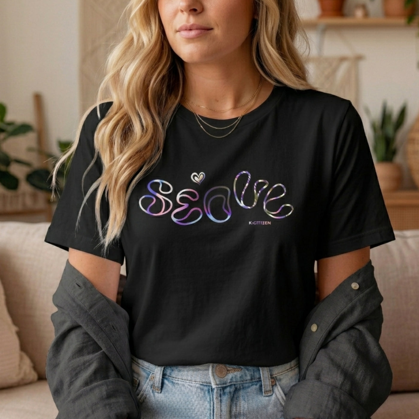 Close-up lifestyle shot of a woman in a black K-citizen t-shirt featuring a colorful holographic-style retro Seoul graphic