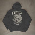 Dark gray hoodie with 'K-Citizen' logo and dragon design on a concrete floor.